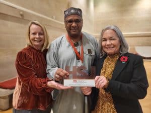 Anne Morris, Clare Cook with Mohammed Elsharif from Bristol City Council.
